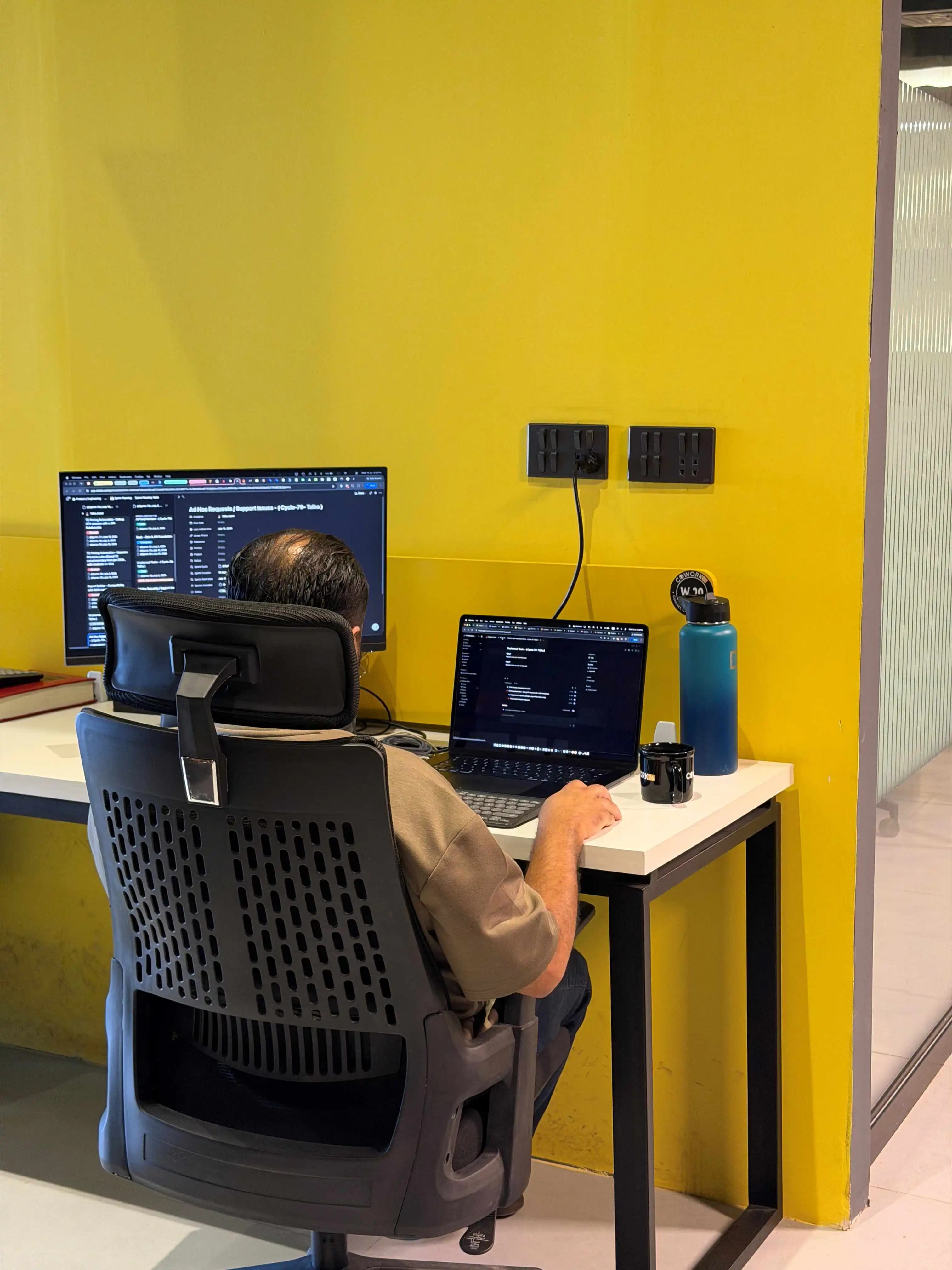 Dedicated desk workspace at Cowork24 Islamabad